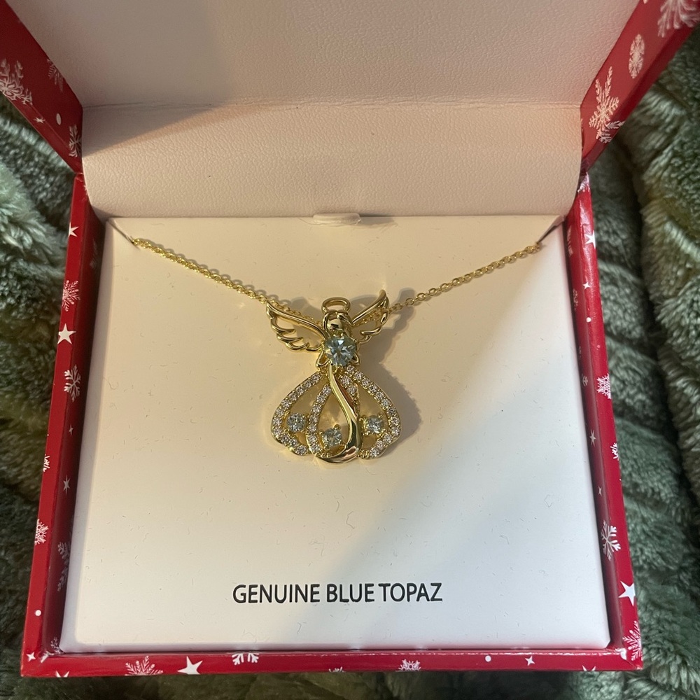Necklace with angel charm